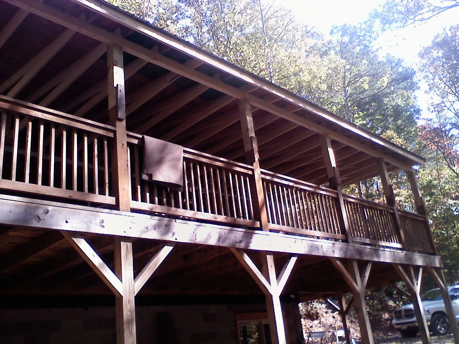 Timber framing under a new elevated porch and deck — Roof Leak Repair in Waccabuc by Roofing Brothers